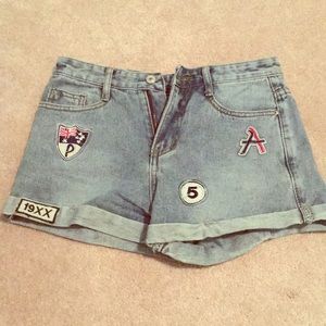 Patched jean shorts